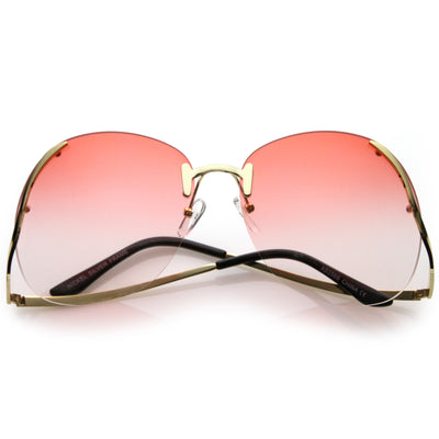 Gafas de sol de gran tamaño con lentes teñidas de color redondo y brazos de metal curvos sin montura C428