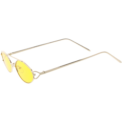 Gafas de sol con lentes de tono de color con barra transversal ovalada de metal pequeño y moderno retro C944