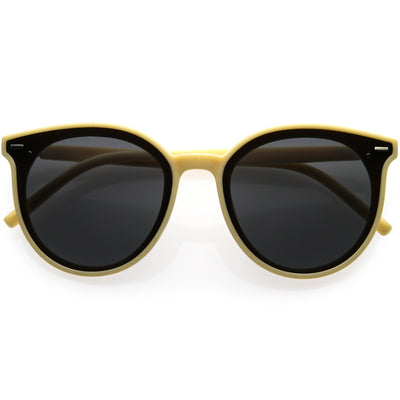 Gafas de sol estilo ojo de gato con montura de cuerno y lentes de color neutro con clase D117
